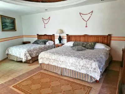 Cama o camas de una habitación en Hotel Posada Mexicana