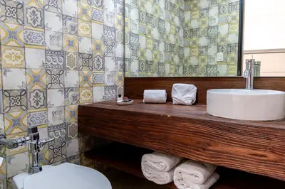 Un baño de Arkana Puebla by Grupo Amber