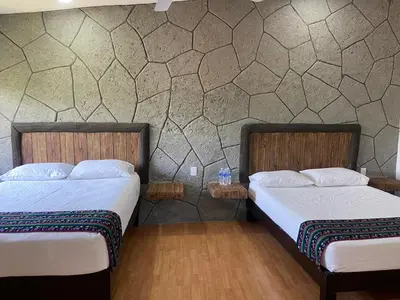 Cama o camas de una habitación en Tonantzincalli SPA Prehispanico