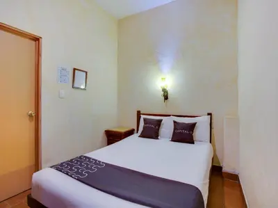 Cama o camas de una habitación en Hotel Valle De Oaxaca