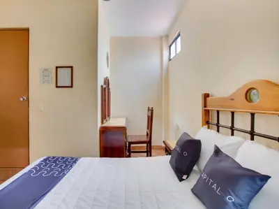 Cama o camas de una habitación en Hotel Valle De Oaxaca