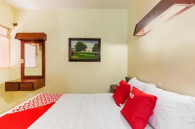 Cama o camas de una habitación en OYO Hotel Emperador, Oaxaca