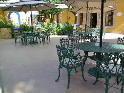 Un restaurante o sitio para comer en Hotel Hacienda Don Cenobio