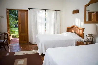 Cama o camas de una habitación en Casa Bugambilia, Un Pequeño Hotel en Tepoztlán