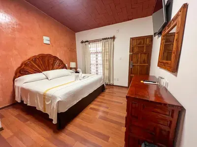 Cama o camas de una habitación en Hotel Anua Oaxaca