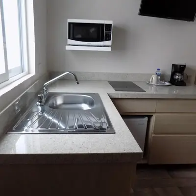 Una cocina o zona de cocina en Ken Tehuacan