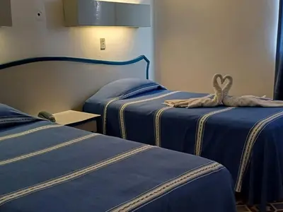Cama o camas de una habitación en HOTEL OLIDEN