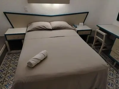 Cama o camas de una habitación en HOTEL OLIDEN