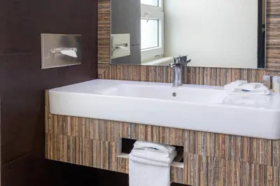 Un baño de Comfort Inn Puebla Centro Hist rico