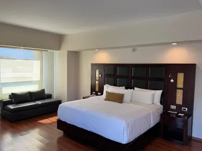 Cama o camas de una habitación en Comfort Inn Puebla Centro Hist rico