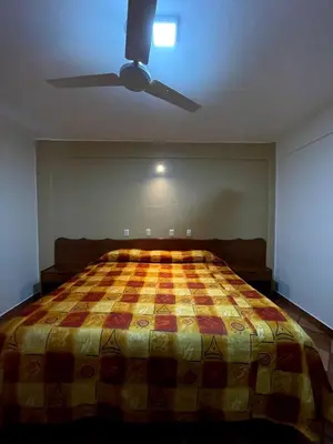 Cama o camas de una habitación en HOTEL BUGAMBILIAS