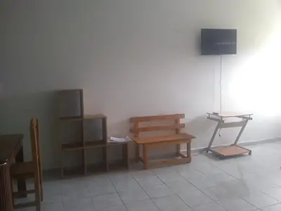 Una televisión o centro de entretenimiento en Hotel Azulejos