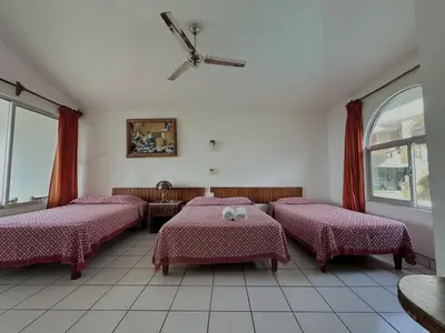 Cama o camas de una habitación en Hotel San Juan