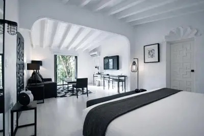 Cama o camas de una habitación en Las Casas B&B Boutique Hotel, Spa & Restaurante Cuernavaca