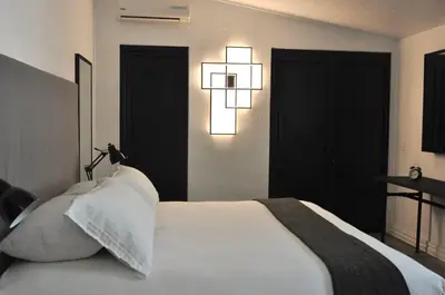 Cama o camas de una habitación en Las Casas B&B Boutique Hotel, Spa & Restaurante Cuernavaca