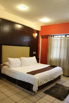 Cama o camas de una habitación en Posada Vista Tepoz