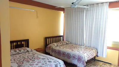 Cama o camas de una habitación en Hotel Olimar