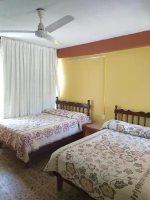 Cama o camas de una habitación en Hotel Olimar