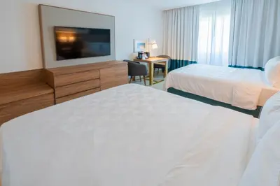 Cama o camas de una habitación en Holiday Inn Acapulco La Isla by IHG