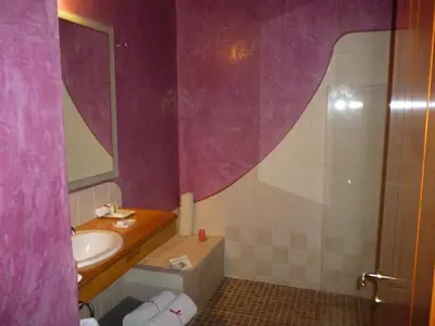 Un baño de Hotel Boutique Casa Catrina