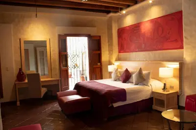 Cama o camas de una habitación en Hotel Boutique Casa Catrina