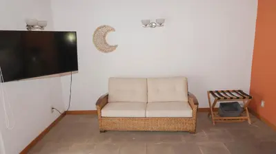 Una televisión o centro de entretenimiento en Finca Catalina Hotel Boutique