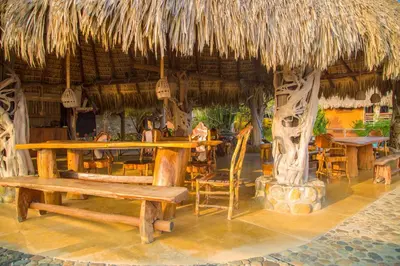 Un restaurante o sitio para comer en Cabañas Las 3 Marias