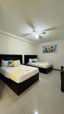 Cama o camas de una habitación en Hotel Real Jaguar