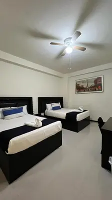 Cama o camas de una habitación en Hotel Real Jaguar