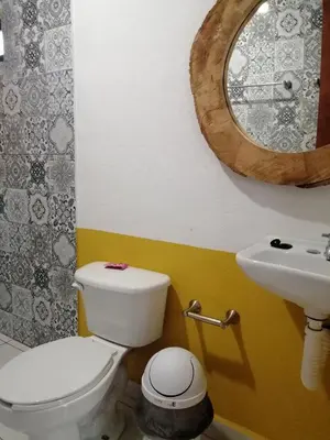Un baño de Hotel Y Suites Axolotl