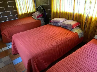 Cama o camas de una habitación en Cabañas Los Abuelos