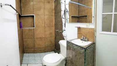 Un baño de Casa con alberca climatizada privada para 8 personas