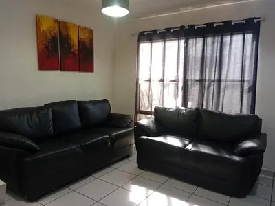 Zona de estar de Casa con alberca climatizada privada para 8 personas