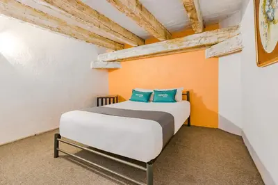 Cama o camas de una habitación en Ayenda Meson de San Sebastian