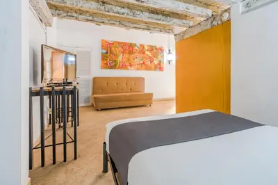 Cama o camas de una habitación en Ayenda Meson de San Sebastian