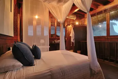 Cama o camas de una habitación en Casa Kundavi Beach Front Paradise