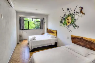 Cama o camas de una habitación en Coccoloba Guest House
