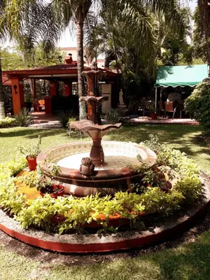 Jardín al aire libre en Villa Paraiso