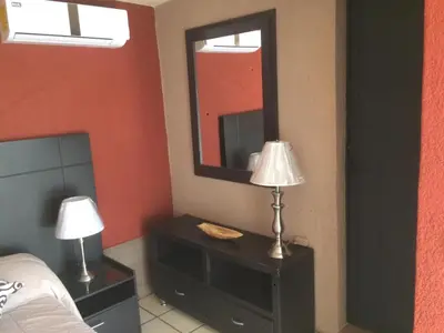 Una televisión o centro de entretenimiento en Villa Paraiso