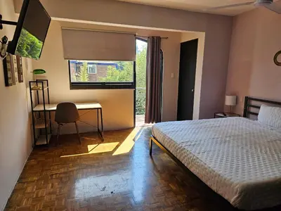 Cama o camas de una habitación en Singular Coyoacán Pepper My Love!