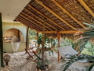 Jardín al aire libre en Beachfrontguesthouse