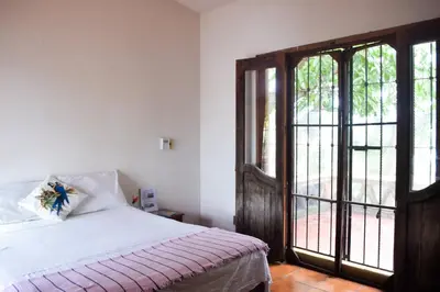 Cama o camas de una habitación en La posada del Monsieur