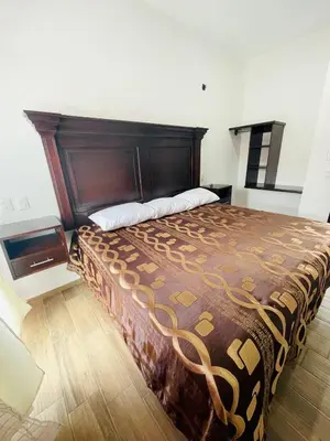 Cama o camas de una habitación en HOTEL LA GRAN MANZANA