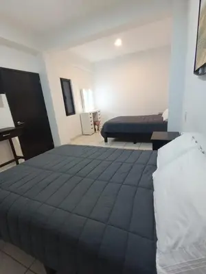 Cama o camas de una habitación en HOTEL BOUTIQUE ÁRBOL De LA VIDA