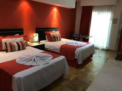 Cama o camas de una habitación en Hotel Empresarial