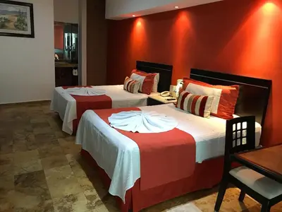 Cama o camas de una habitación en Hotel Empresarial