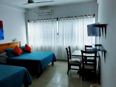 Cama o camas de una habitación en Hotel La Estrella Polar
