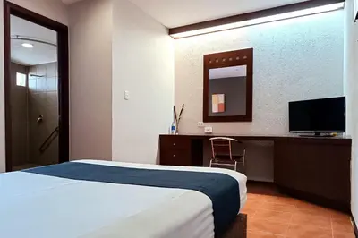 Cama o camas de una habitación en Hotel Panamerican