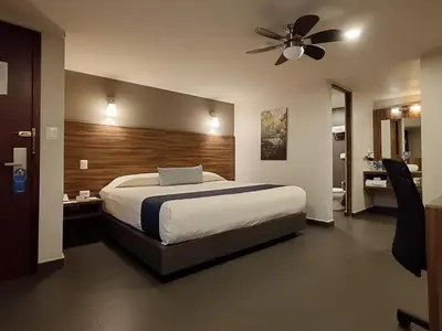 Cama o camas de una habitación en Hotel Panamerican