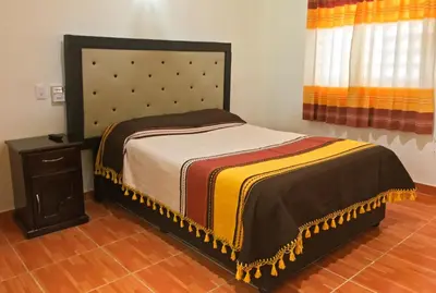 Cama o camas de una habitación en Casa Elim-Oaxaca